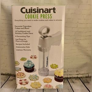 New in Box Cuisinart cookie press. Never used.  6 tips and 18 presses.